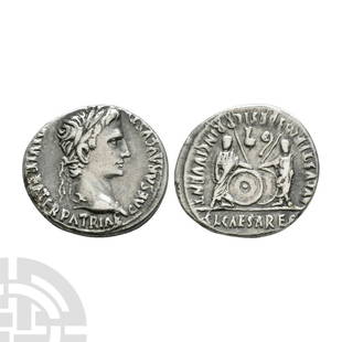 Augustus - Gaius and Lucius AR Denarius: 2 B.C.-13 A.D. Lyons mint. Obv: CAESAR AVGVSTVS DIVI F PATER PATRIAE legend with laureate head right. Rev: AVGVSTI F COS DESIG PRINC IVVENT Gaius and Lucius standing front, each with a hand resting