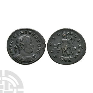 Licinius I - Genius AE Heavy Follis: 310-313 A.D. Trier mint. Obv: IMP LICINIVS PF AVG legend with laureate cuirassed bust right. Rev: GENIO POP ROM legend with Genius standing holding patera and cornucopia with T - F across fields;