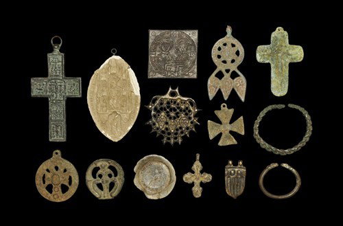 Medieval Mixed Item Group: Circa 10th-15th century AD. Various periods, including two Viking child's bracelets, one of twisted wire, the other solid with animal head terminals; five Byzantine pendant crosses, one depicting six 