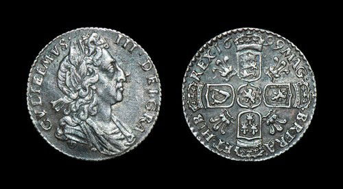 English Milled William III - 1699 - Sixpence: Dated 1699. Obv: bust right with GVLIELMVS III DEI GRA legend. Rev: cruciform arms with plumes with MAG BR FRA ET HIB REX and date legend. S. 3546; ESC 1577(S). 2.95 grams.