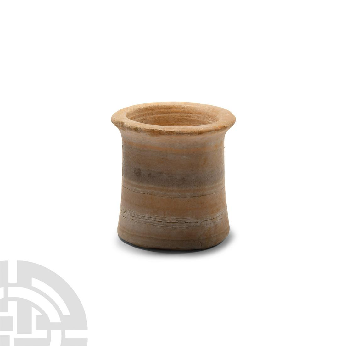 Egyptian Banded Alabaster Jar: Late Period-Ptolemaic Period, 664-30 B.C. The body with slightly tapering sidewalls and everted rim, possibly Bactrian. Cf. Guidotti, M.C., Vasi dall'epoca protodinastica al nuovo regno, Rome, 1991, p