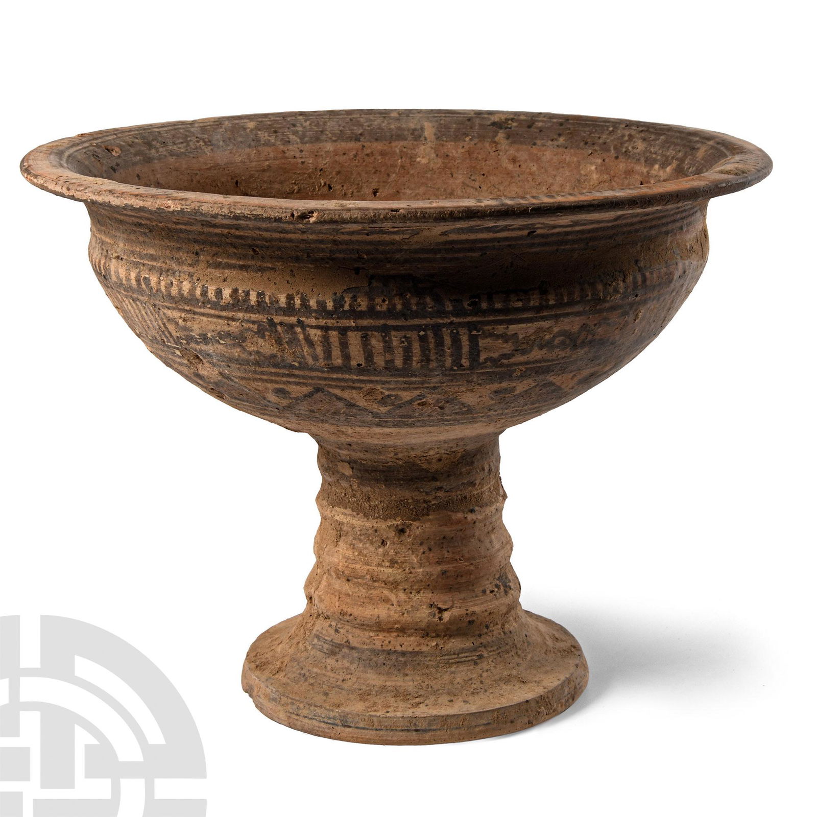 Western Asiatic Geometric Iron Age Ceramic Chalice: 2nd-1st millennium B.C. The bowl of hemispherical form with C-section neck and everted rim, ribbed stem and everted foot; the rim, neck and bowl painted with solid lines, dashes and circumferential ba