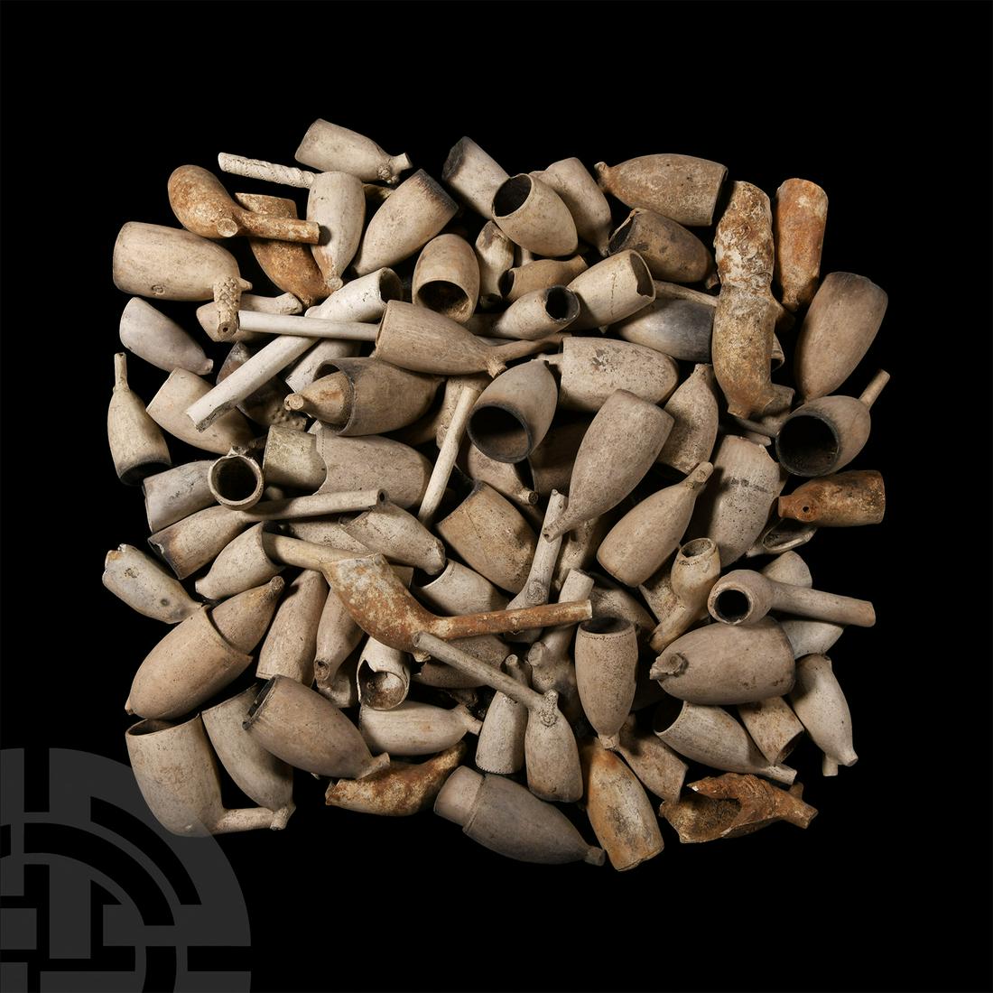 Post Medieval Clay Pipe Bowl Group Including Armorials: Circa 18th century A.D. Together with decorative designs, comprising bowls of various shapes and dates; together with a number of stems, some decorative. 1.2 kg total, 43-11.7 cm (1 3/4 - 4 5/8 in.). 