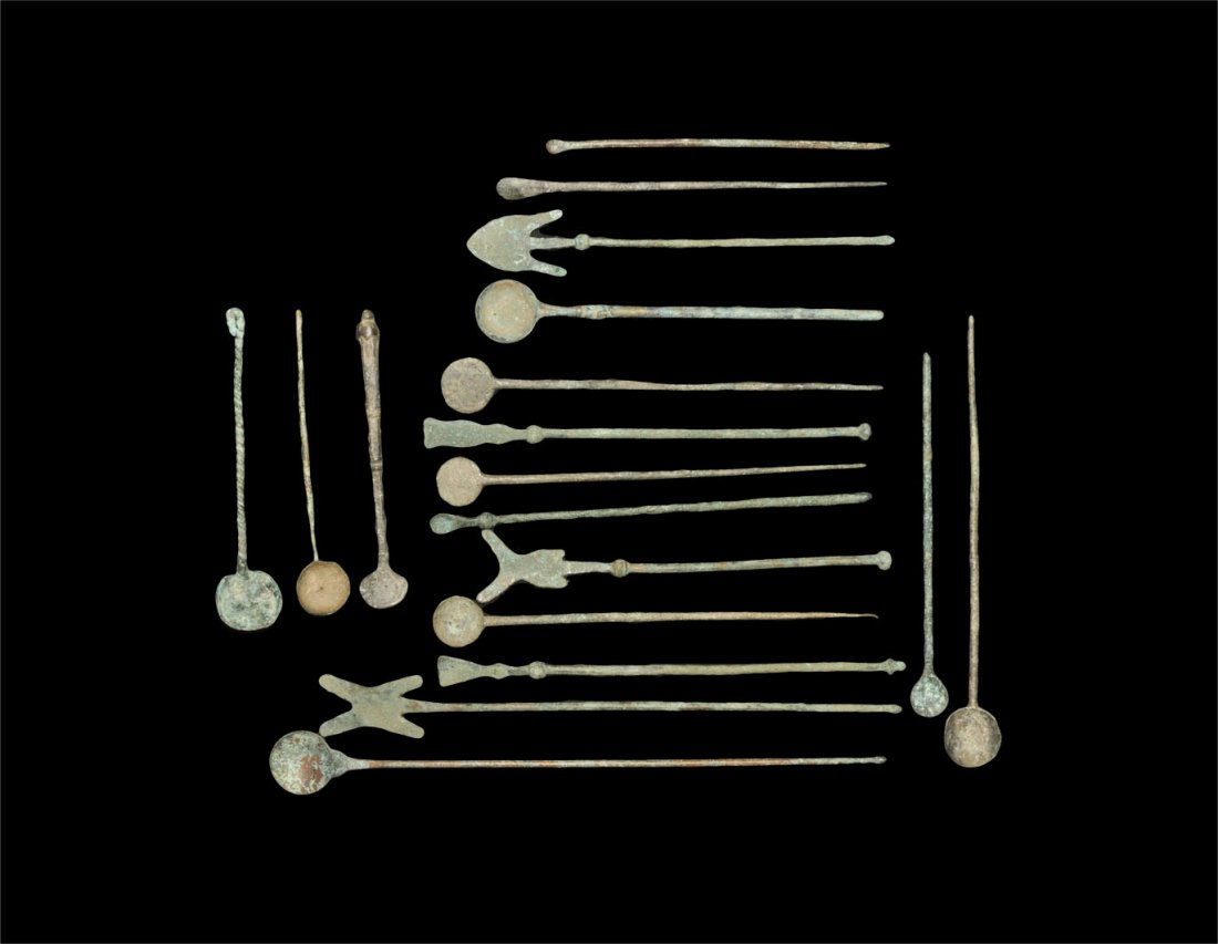 Byzantine Style Surgical and Cosmetic Implement Group: A mixed group of implements of various periods comprising: six spoons with tapering shafts; three spoons with balustered shafts; one palette with tapering shaft; one spoon with separate bowl and hooke