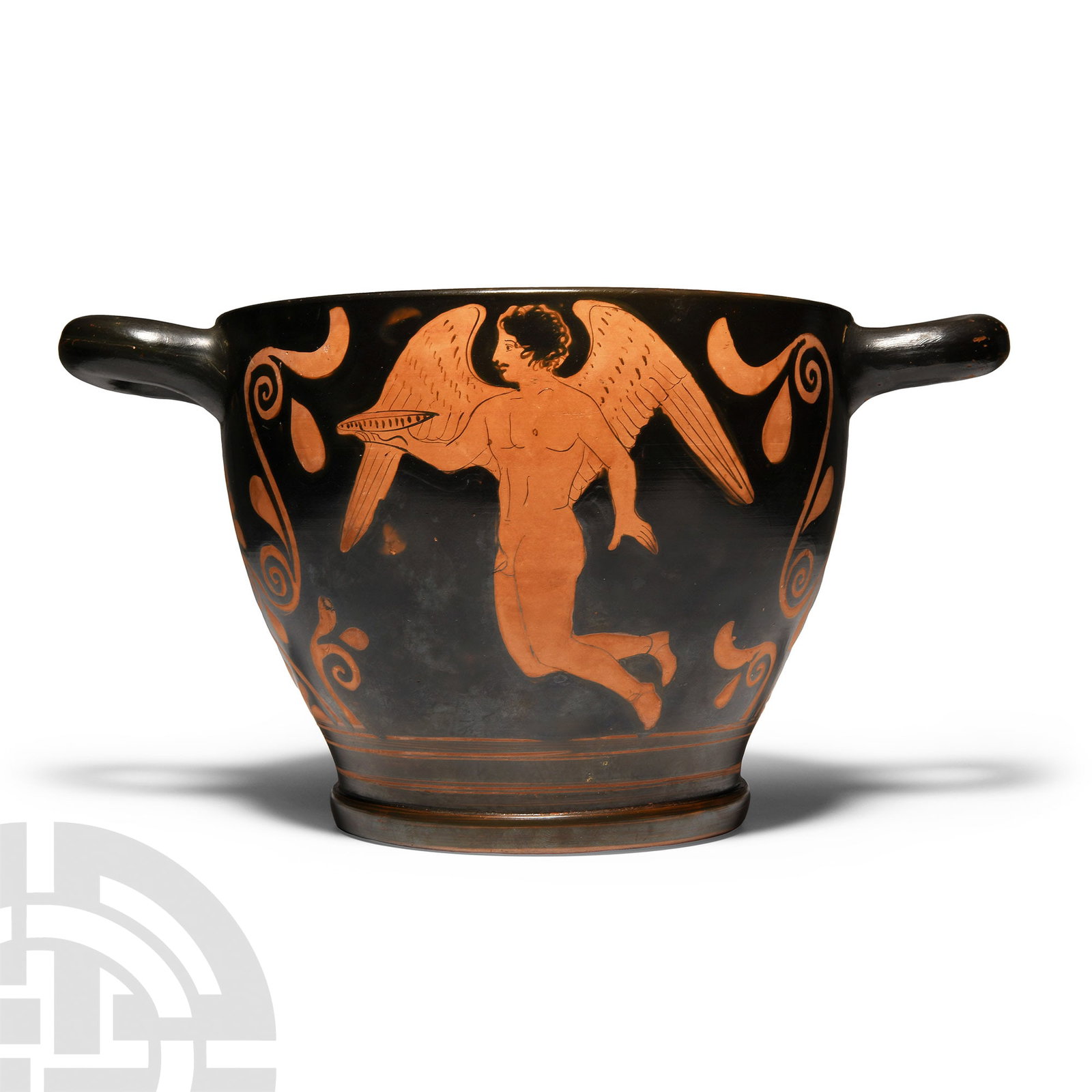 Greek Blackware Skyphos from the Choes Group Workshop of The Iliupersis Painter: 4th century B.C. With rounded loop handles with elaborate palmettes below, pedestal foot; Side A with nude Eros flying left, holding a dish in his right hand; Side B with a standing female (Psyche?) w