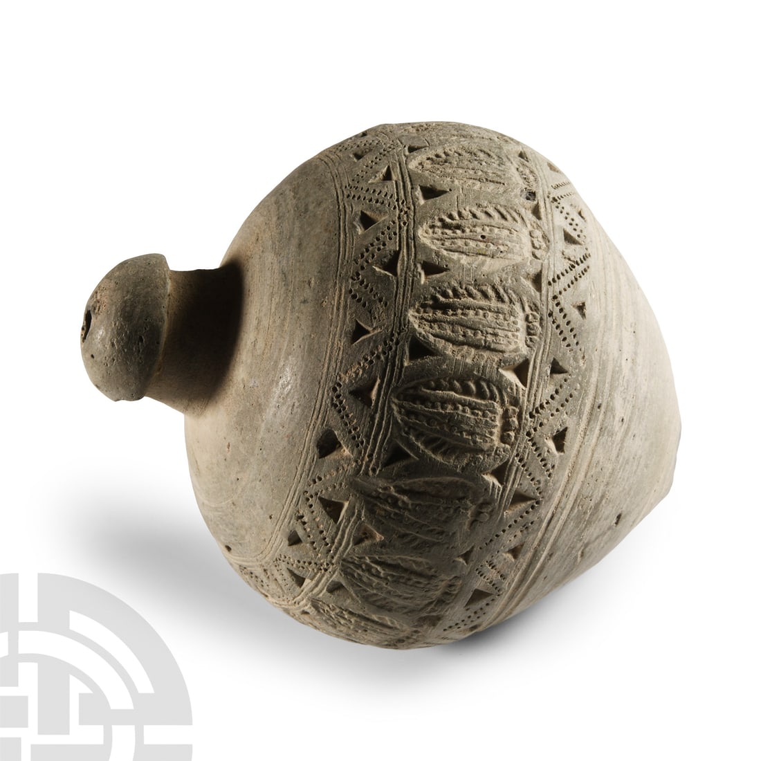 Byzantine 'Greek Fire' Ceramic Fire Bomb or Hand Grenade: 9th-11th century A.D. Piriform body with domed filler-hole, raised vertical flanges to the shoulder; intended to be filled with explosive liquid and wick, used as a hand grenade. Cf. Arendt, W. I., Gr