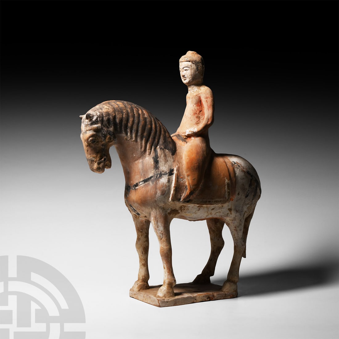 Chinese Tang Terracotta Horse and Rider: Tang Dynasty, 618-907 A.D. or later. Modelled in the round, the animal posed standing on a rectangular base, its stocky neck arched and head held facing down, tail resting between hindlegs, with paint