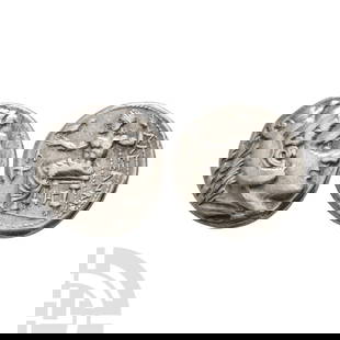 Ancient Greek Coins - Macedonia - Alexander III (The Great) under Kassander - Zeus AR Tetradrachm: Circa 310-307 B.C. Amphipolis mint. Obv: head of Herakles right, wearing lion skin headdress. Rev: Zeus Aëtophoros seated left, holding sceptre; ? above bucranium in left field, monogram below throne