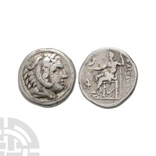 Ancient Greek Coins - Macedonia - Alexander III (The Great) - Zeus AR Tetradrachm: Circa 315-294 B.C. Amphipolis mint. Obv: head of Herakles right, wearing lion's skin headdress. Rev: ALEXANDROU, Zeus seated left, right leg drawn back, holding eagle and sceptre; L and torch before,