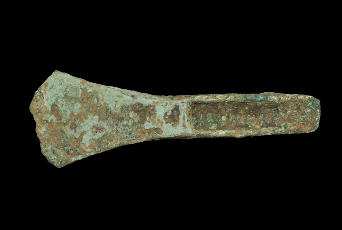Bronze Age Bronze Palstave Axe: Circa 1500 BC. A cast bronze palstave axe with spatulate blade and shallow recess to the rear of each face. Found Thanet, Kent, UK, 2011. Bronze, 332 grams, 16 cm (6 1/4").