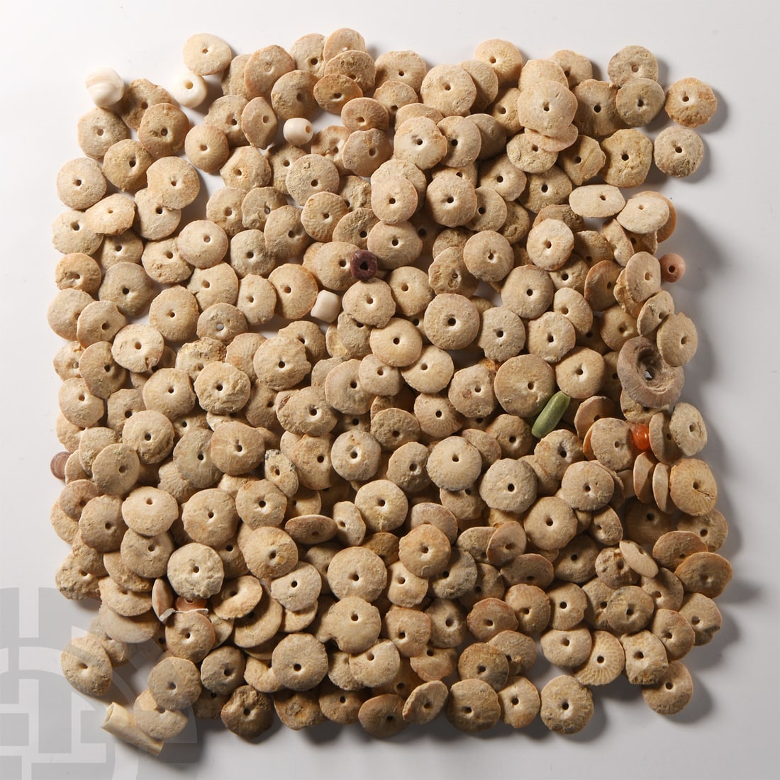 Mesopotamian Alabaster Lenticular Necklace Bead Group: Circa 3rd millennium B.C. Comprising a quantity of disc-shaped beads, each pierced for stringing. Cf. Golani, A., Jewelry from the Iron Age II Levant, Zurich, 2013, fig.30.3, for similar beads 53 gram