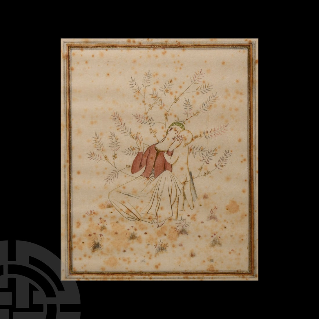 Framed Watercolour Painting: Persia, late 19th-early 20th century A.D.. With a mother and child seated on grass amongst flowers, wispy tree growing behind, gilt flecks to the woman's clothes, jewellery, the tree and flowers, gilt