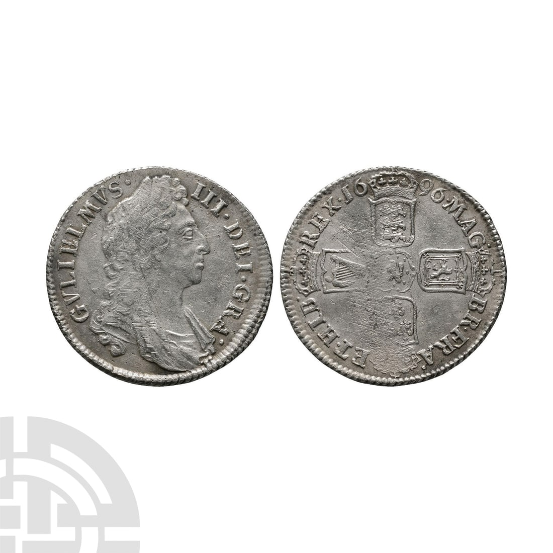 English Milled Coins - William III - 1696 - AR Shilling: Dated 1696 A.D.. First bust. Obv: profile bust with GVLIELMVS III DEI GRA legend. Rev: cruciform arms with MAG BR FRA ET HIB REX legend and date. S. 3497; ESC 6th, 1104 (old 1078). 5.77 grams, 25 mm.