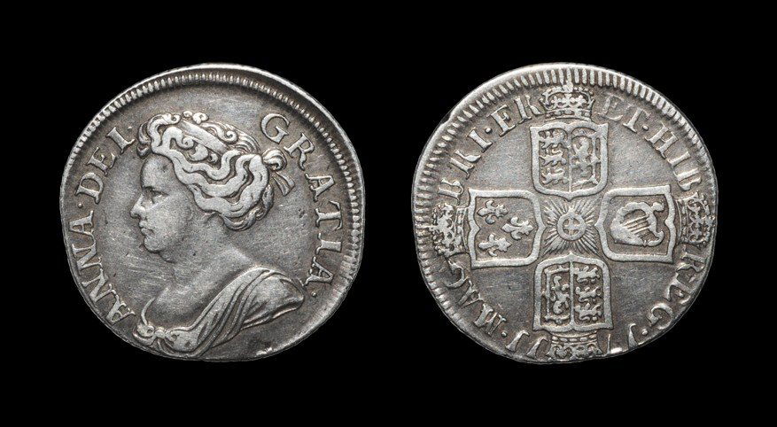 English Milled Anne - 1711 - Offstruck Shilling: Dated 1711, fourth bust. Obv: profile bust with ANNA DEI GRATIA legend. Rev: cruciform shields with date and MAG BRI FR ET HIB REG legend. S. 3610; ESC 1158. 5.95 grams.