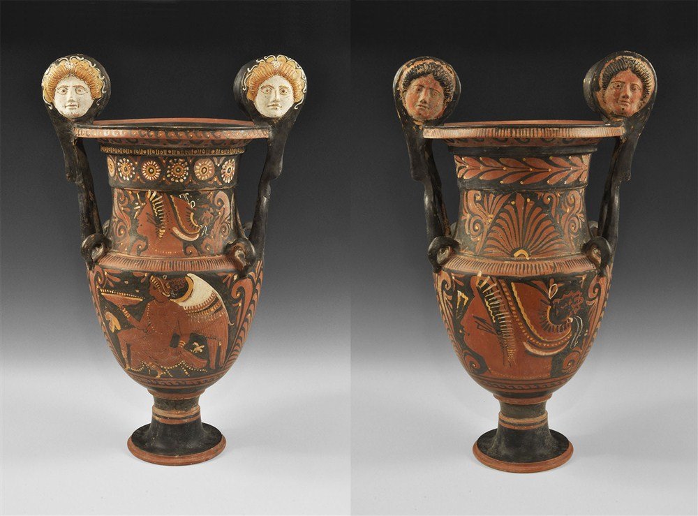 Greek Red-Figure Volute Krater with Medusa Heads and La: Apulian, 4th century BC A fine and large volute krater of Magna Graecian workmanship; to one side, the head of a lady of fashion, her hair dressed in a sakkos with stephane at the hairline; locks fall