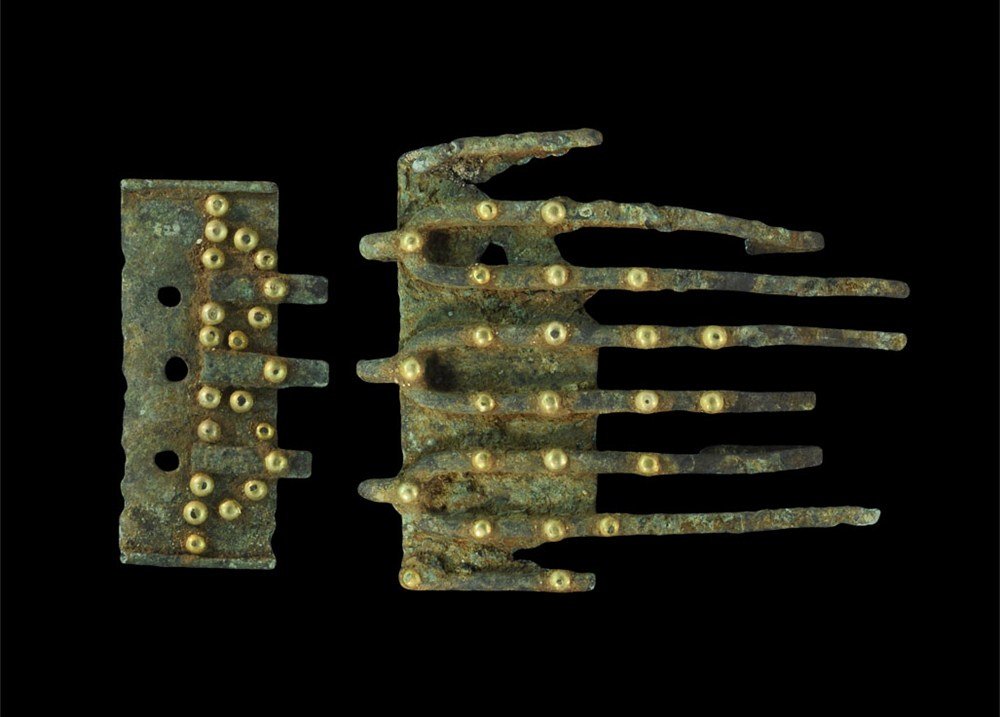Iron Age Bronze Belt Fittings with Gold Detailing: 6th-5th century BC A South Arabian fabricated two-piece belt closure comprising: a rectangular plate with transverse D-section bars, hooked at the forward edge and bifurcated to form flat extended rib