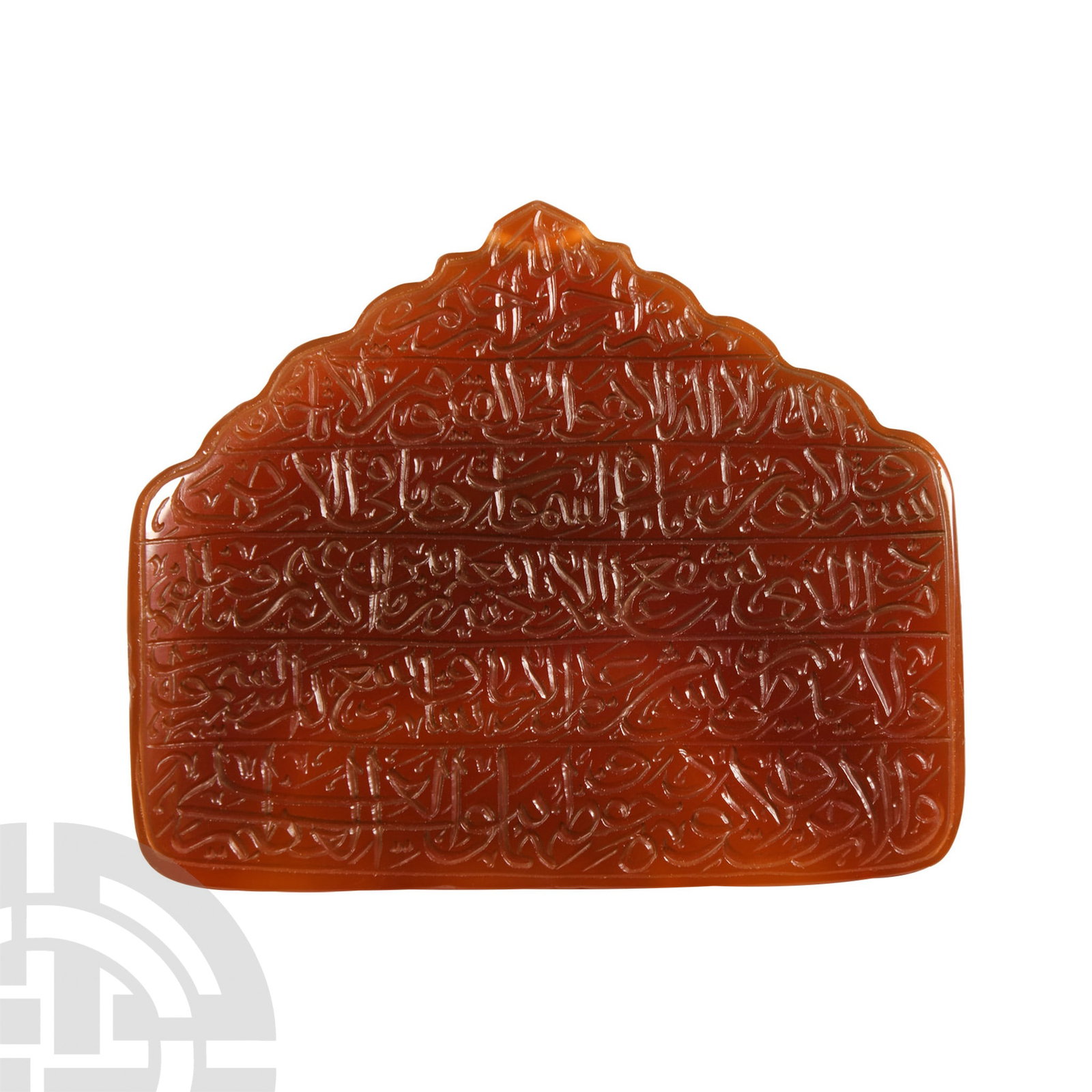 Qajar Calligraphic Pendant with Kufic Inscription: 20th century A.D. Pentagonal carnelian plaque with dentilled lower edges, six transverse bands of calligraphic script. 81 grams. 96 mm (3 3/4 in.). with a London, UK gallery 1971-early 2000s. [No Rese