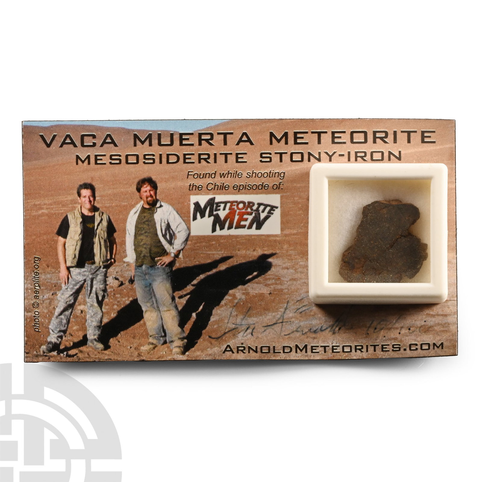 Natural History - Mesosiderite Stony-Iron Meteorite: Found circa 2010 A.D. Meteorite in a cuboid capsule; Vaca Muerta. 1.67 grams, 20 mm (3/4 in.). Found in Chile's Atacama desert while filming an episode of the TV series Meterorite Men. Acquired from S