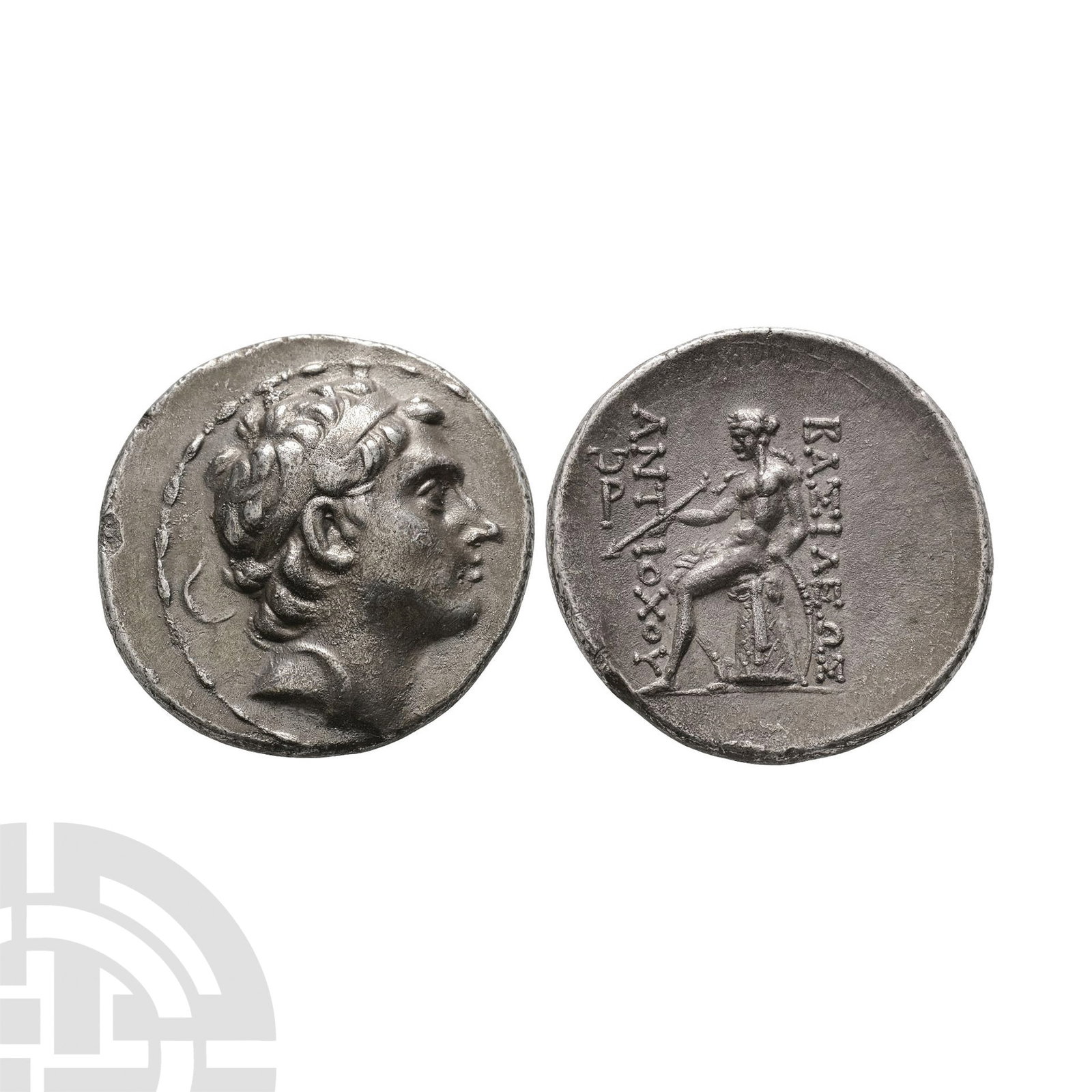 Ancient Greek Coins - Seleukid - Antiochos III Megas - Apollo AR Tetradrachm: 213-208 B.C. Antioch ad Orontem mint. Obv: diademed head right. Rev: BASILEWS ANTIOXOY, Apollo seated left on omphalos, testing arrow and resting left hand on grounded bow, inverted Omega over Rho in