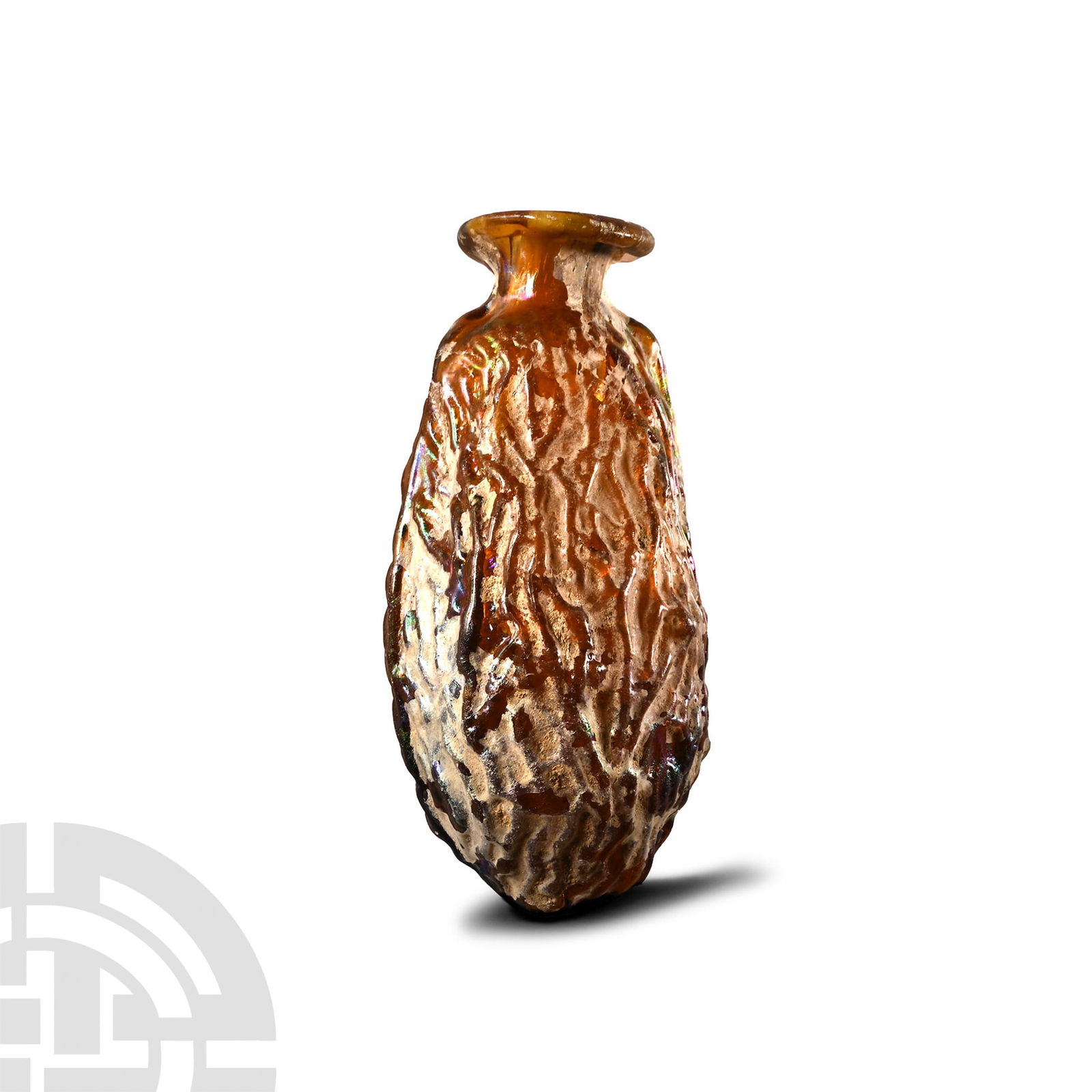 Roman Sidonian Mould-Blown Glass Flask in the Shape of a Date: 3rd century A.D.. Mould-blown with elliptical body, short neck and thick everted rim in amber-tinted glass, with modelled wrinkles to resemble date fruit. See Whitehouse, D., Roman Glass in the Cornin