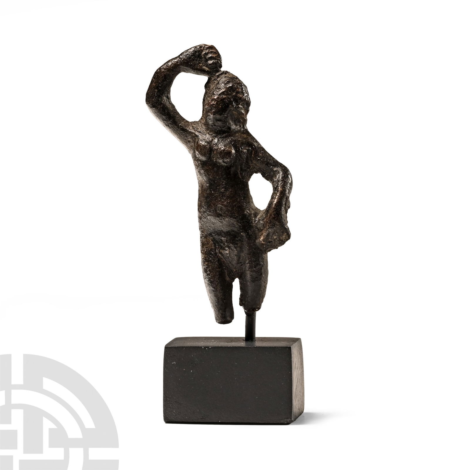 Roman Bronze Venus Anadyomene Statuette: 1st century A.D.. Modelled nude with left hand resting on her hip and right hand above her head, detailed hair cascading down her back, pellet breasts and dimpled navel; mounted on a custom-made stand