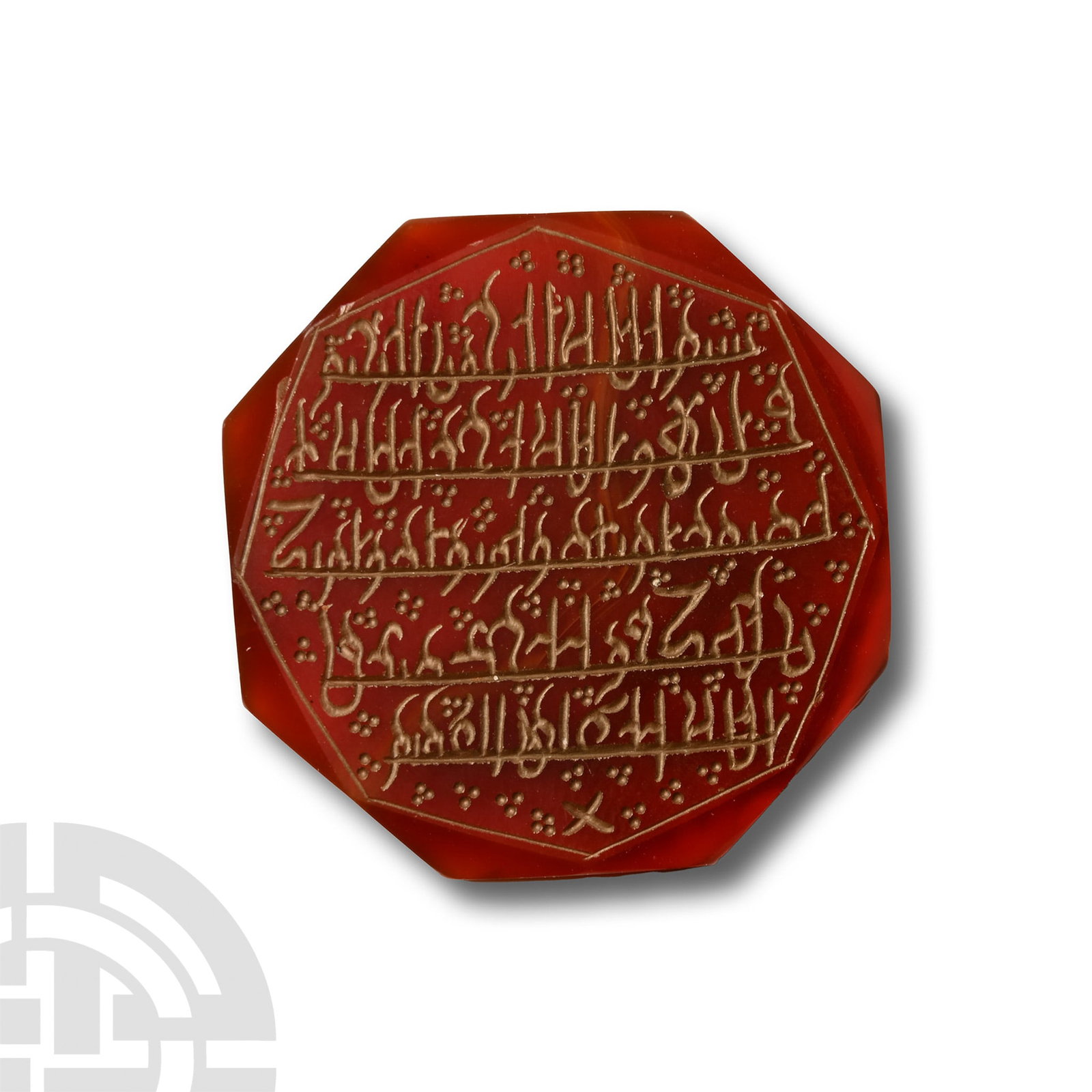 Qajar Plaque with Kufic Inscription: 19th-20th century A.D.. Octagonal carnelian plaque with offset chamfered edges, incised calligraphic script text in five lines with clusters of pointillé ornament. 10 grams, 34 mm (1 3/8 in.). with a