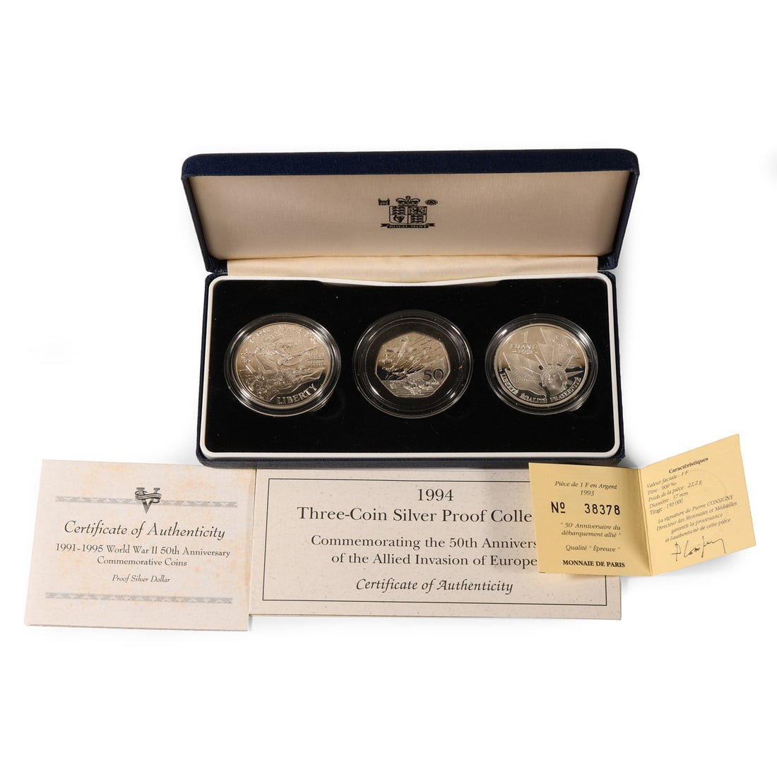 World War II. 50th Anniversary Cased Proof Silver Commemorative Coin Collection.: 1994. Silver Proof Three-Coin Collection, FDC Commemorating the 50th Anniversary of the Allied Invasion of Europe, to mark the Anniversary of the D-Day Landings, two countries have joined forces with 