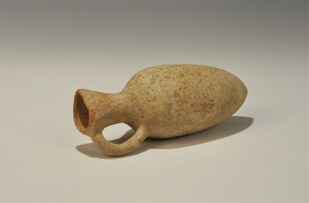 Greek Cypriot Ceramic Single Handed Jug: 3rd millennium BC A terracotta bulbous amphora with ovoid-section neck and spout, single strap handle to the rear. 313 grams, 22 cm (8 1/2"). UK art market, acquired prior to 1980. [No Reserve]