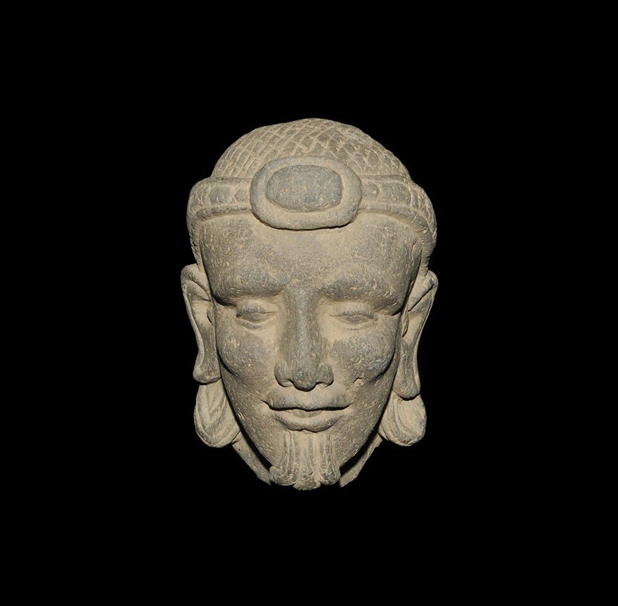 Ghandaran Stone Carved Male Head: 2nd-3rd century AD. A carved schist male head with finely modelled features, flowing hair, small beard and diadem to the forehead. 1.9 kg, 15.5 cm (6"). UK art market, acquired prior to 1980.