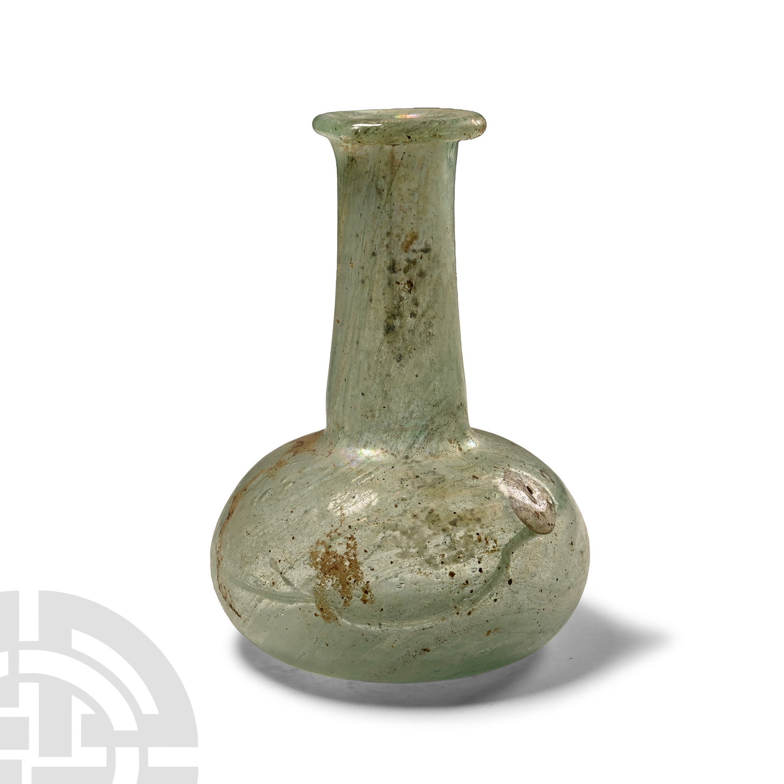 Roman Glass Bottle with Elongated Neck: 1st-2nd century A.D. Toilet bottle with dimple base, flared neck and carination below the mouth, rounded rim. Cf. Whitehouse, D., Roman Glass in the Corning Museum of Glass, vol.2, New York, 2001, ite