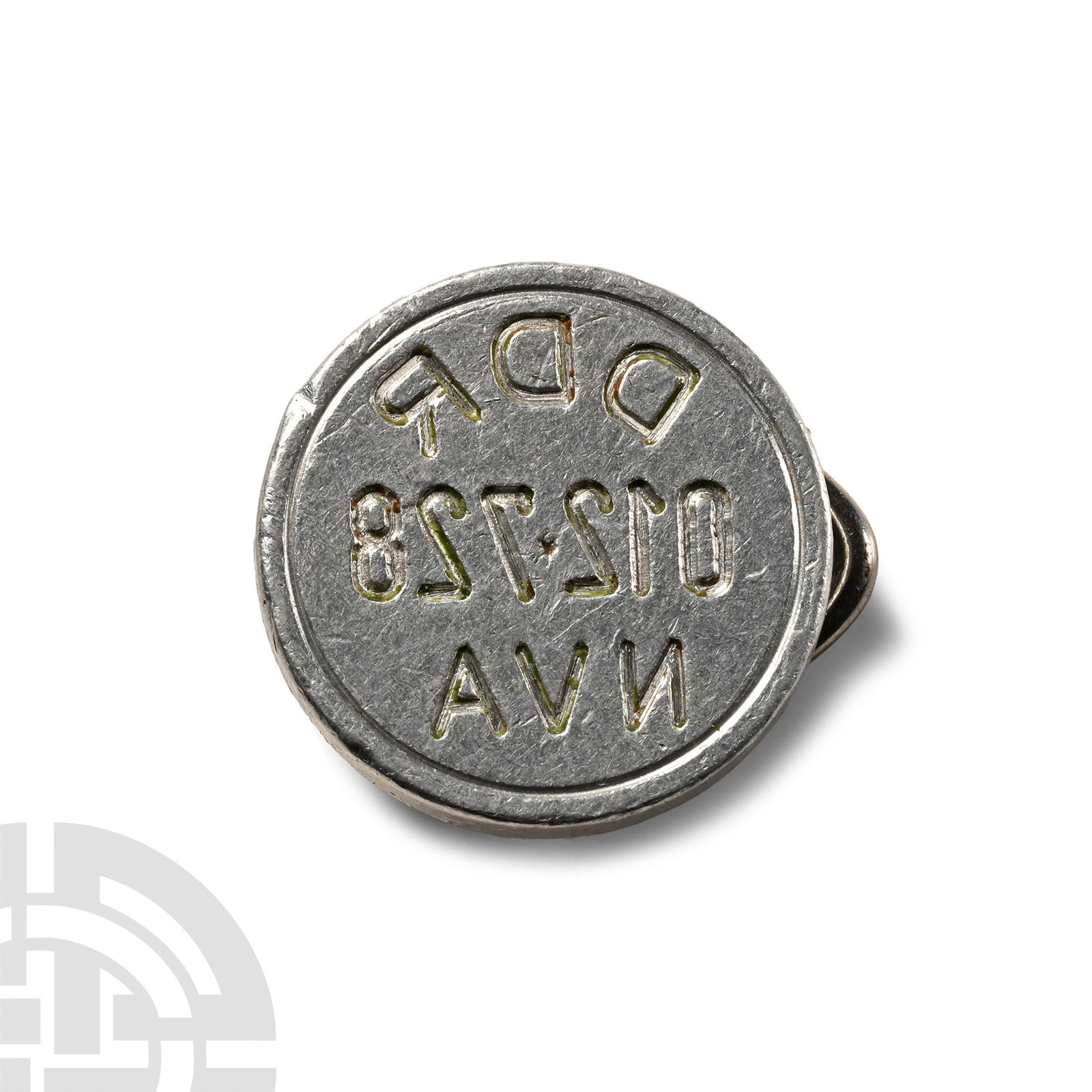 East German (DDR) Army Seal: Circa 1950s-1970s A.D. Discoid with raised stud to reverse, pierced with a loop; reverse legend 'DDR / 012728 / NVA'; used as a security seal. 4.29 grams, 25 mm (1 in.). [No Reserve] Ex German collect
