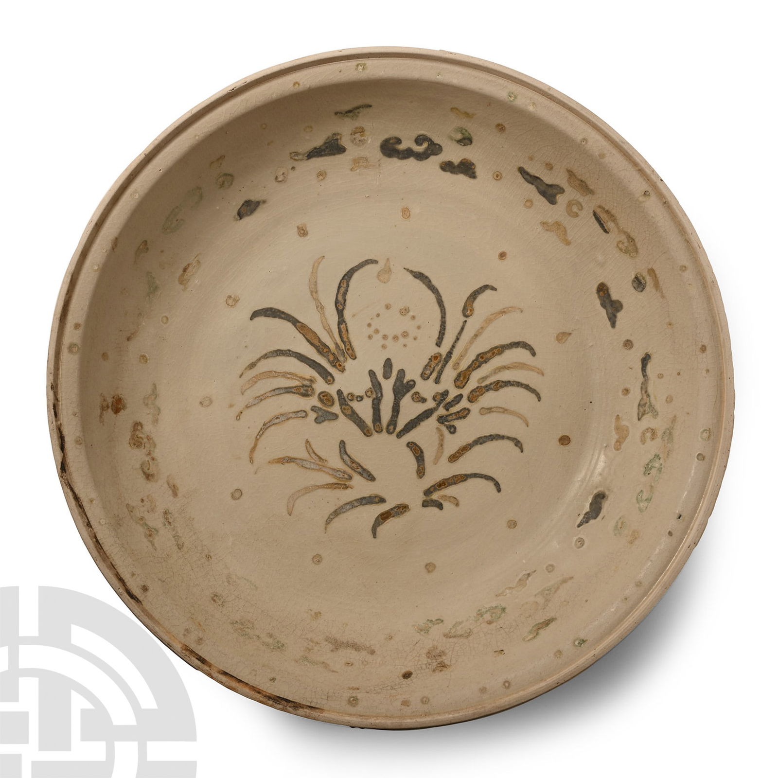 Very Large Hoi An Shipwreck Glazed Blue and White Dish: 15th century A.D. Broad shallow bowl with substantial basal ring, band of cloud pattern ornament enclosing a floral motif. 1.65 kg, 32.5 cm (12 3/4 in.). [No Reserve] Ex Butterfield and Butterfield au