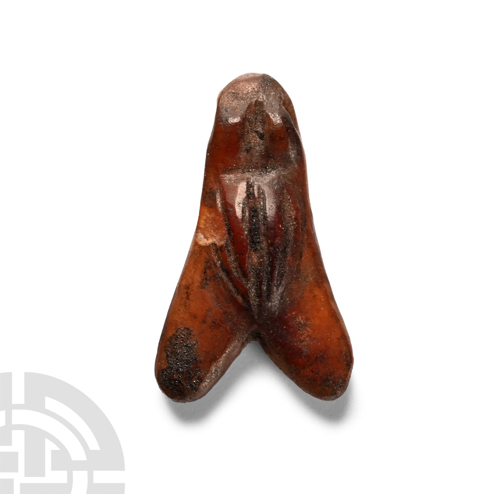 Egyptian Carnelian Fly Amulet: Late Period, 664-332 B.C. Carved with simple body and eye detailing and polished; drilled through the eyes for suspension. Cf. Andrews, C., Amulets of Ancient Egypt, London, 1994, pp.62-3. 0.41 grams,