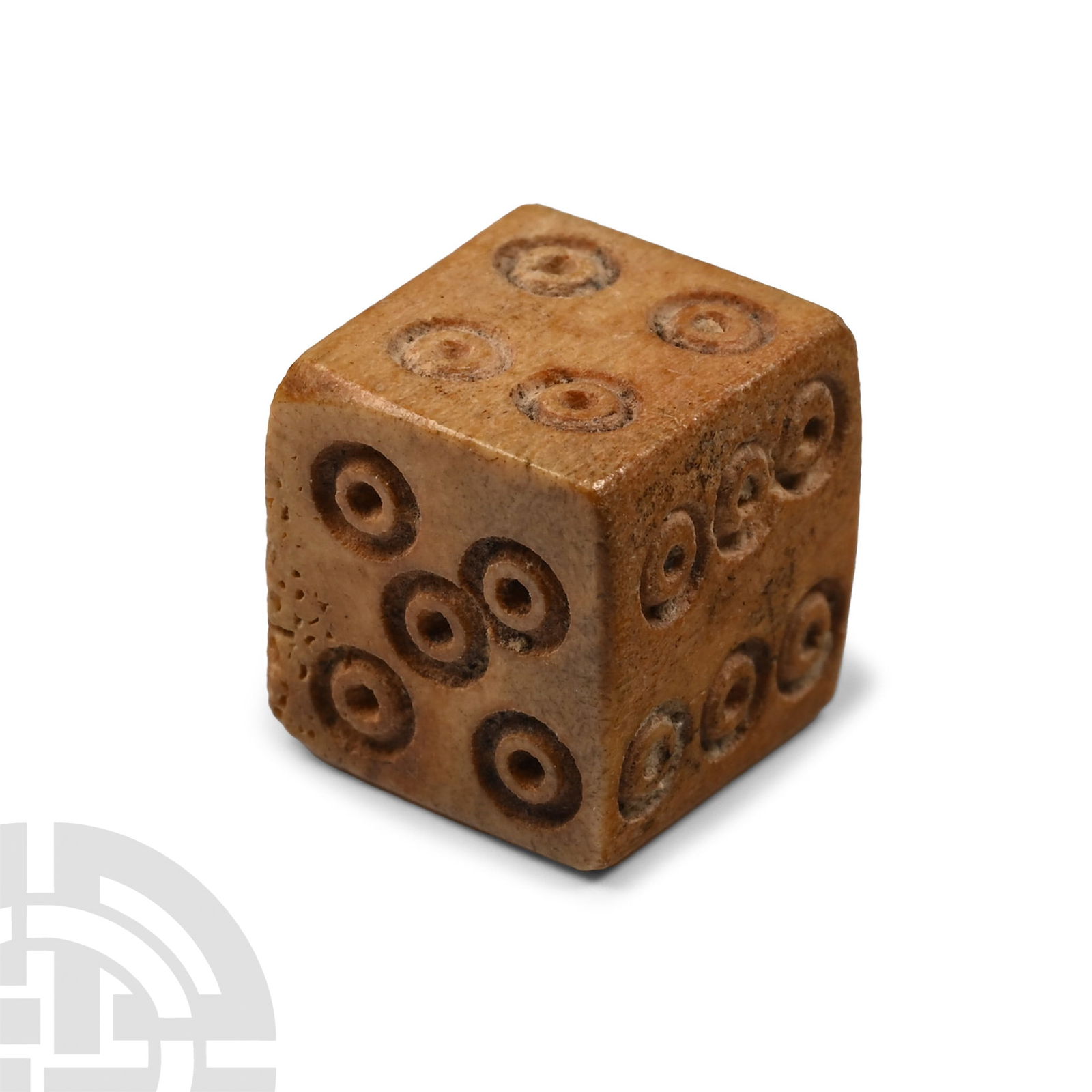 Roman Bone Dice: 1st-2nd century A.D. With incised ring-and-dot markings disposed 1:6, 2:5, 3:4. Cf. Allason-Jones, L. & Miket, R., The Catalogue of Small Finds from South Shields Roman Fort, Newcastle, 1984, item 2.8