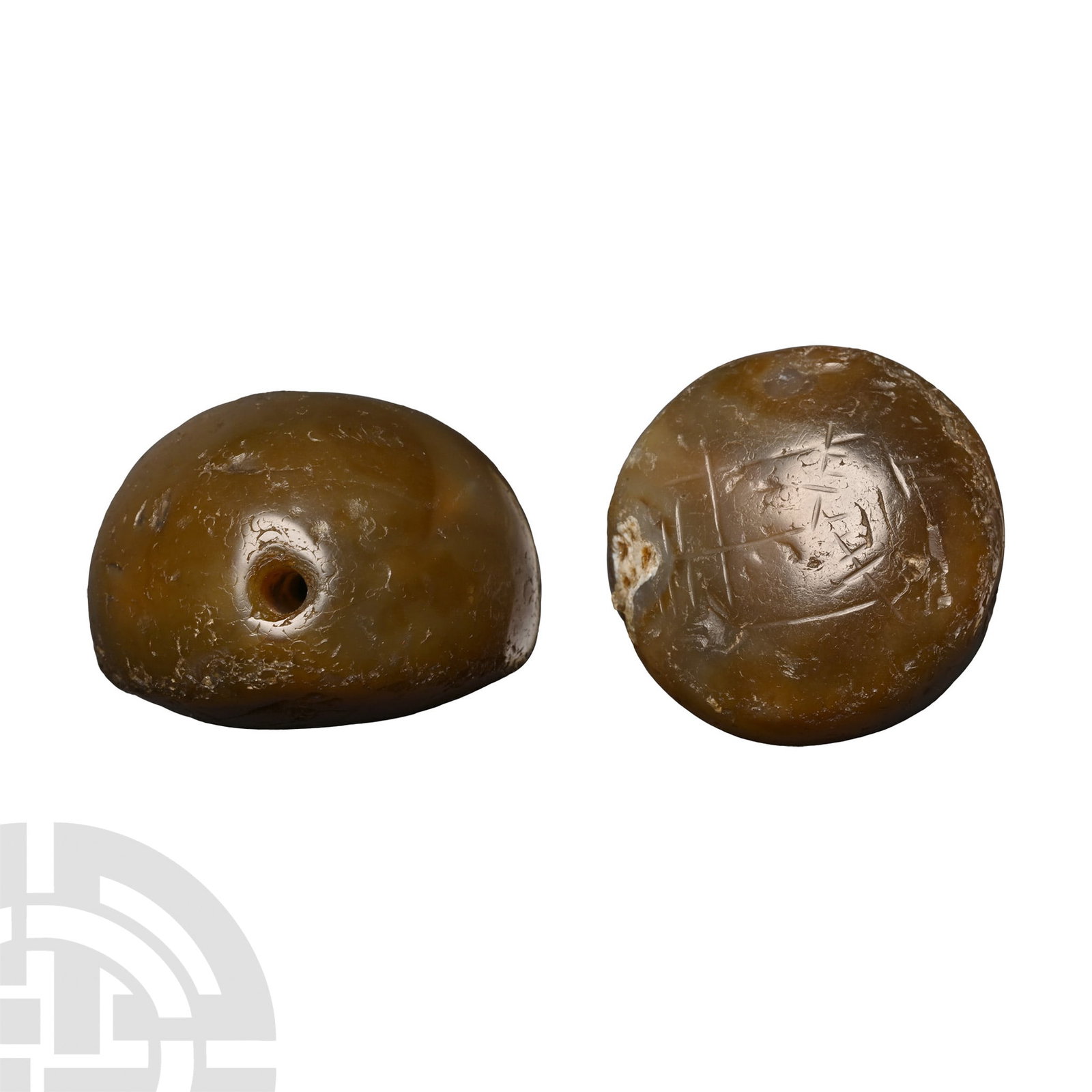Sasanian Banded Agate Stamp Seal: 4th-6th century A.D. Plano-convex in profile with lightly incised geometric pattern to the underside, rectangle with vertical stem on a tiered base with lateral fronds; possibly a stylised winged figu