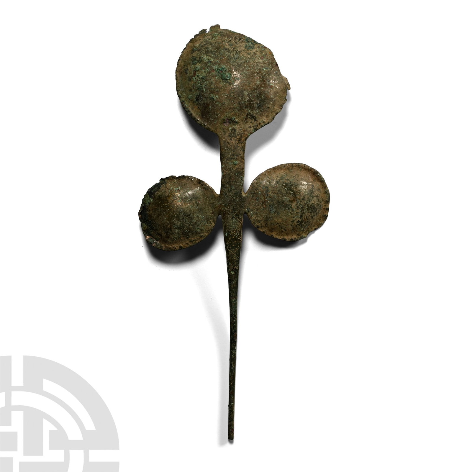 Luristan Bronze Floral-Headed Cloak Pin: 13th-7th century B.C. Narrow spiked stem developing to a flat-section shank with two flanking dished lobes, and one larger at the end, each with pointill? detailing to the rim. 24 grams, 15 cm (5 7/8 
