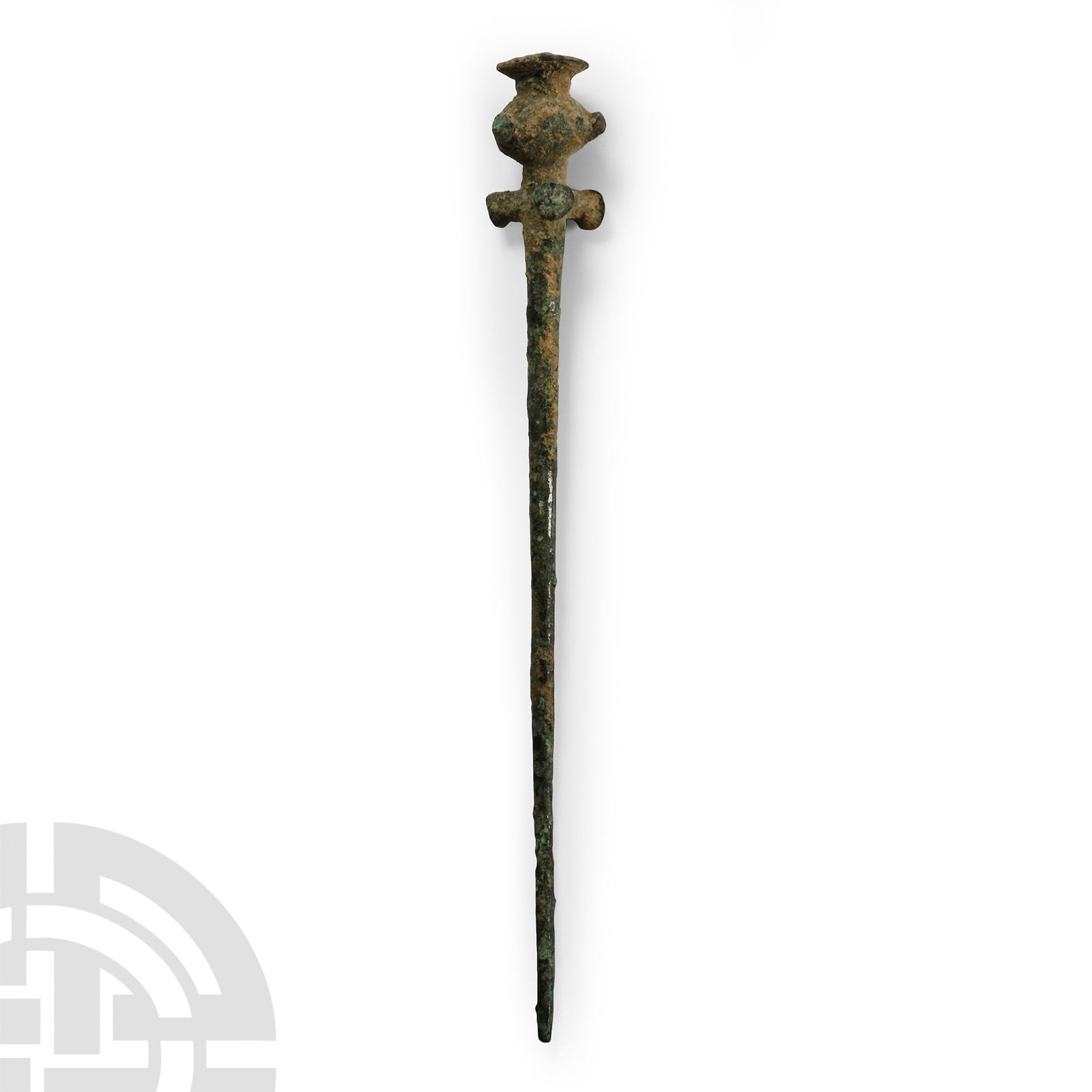 Luristan Bronze Poppy-Headed Dress Pin: 13th-7th century B.C. With a short tapering body, poppy-head finial and three radiating lugs. 17.9 grams, 12.5 cm (5 in.). [No Reserve] Acquired on the UK art market before 2000. Property of an Essex,