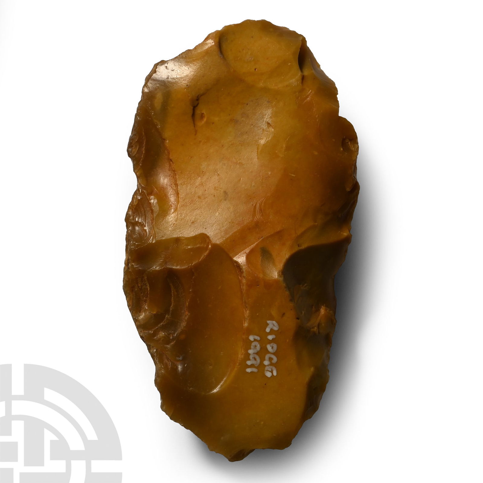 Stone Age British Yellow-Orange Flint Hand Axe: Middle Palaeolithic Period, 250,000-60,000 B.P. Plano-convex in section with narrow cutting edge; marked 'Ridge 1991' in white ink. 188 grams, 10.3 cm (4 in.). [No Reserve] Found from 20th century exc