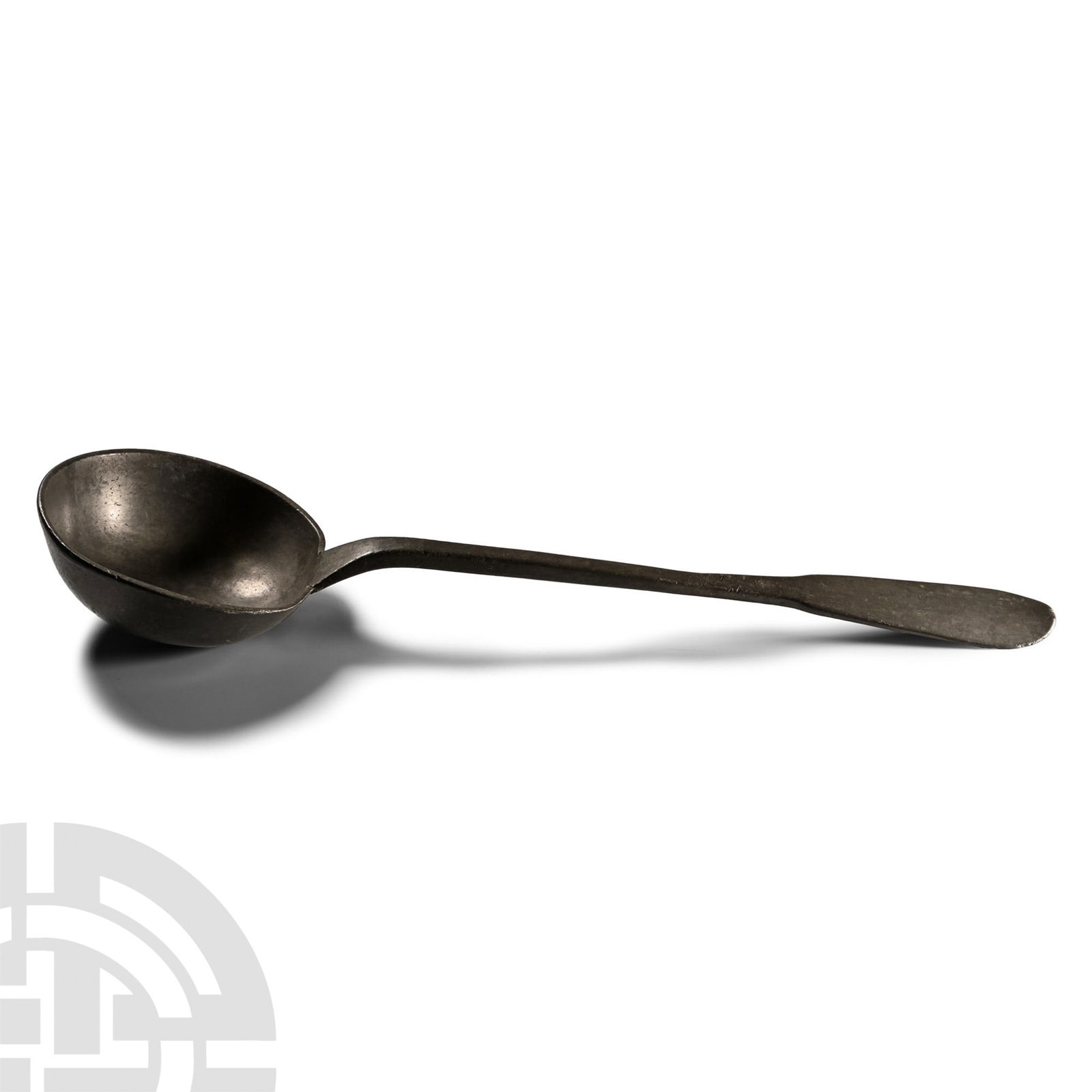 'Lord Carnarvon' Highclere Castle Pewter Ladle: Late 19th century A.D. Base metal ladle with deep bowl, thick neck and spatulate finial, slightly curved in profile; indistinct punched pellet marks to reverse of handle. 407 grams, 37.7 cm (14 7/8 in