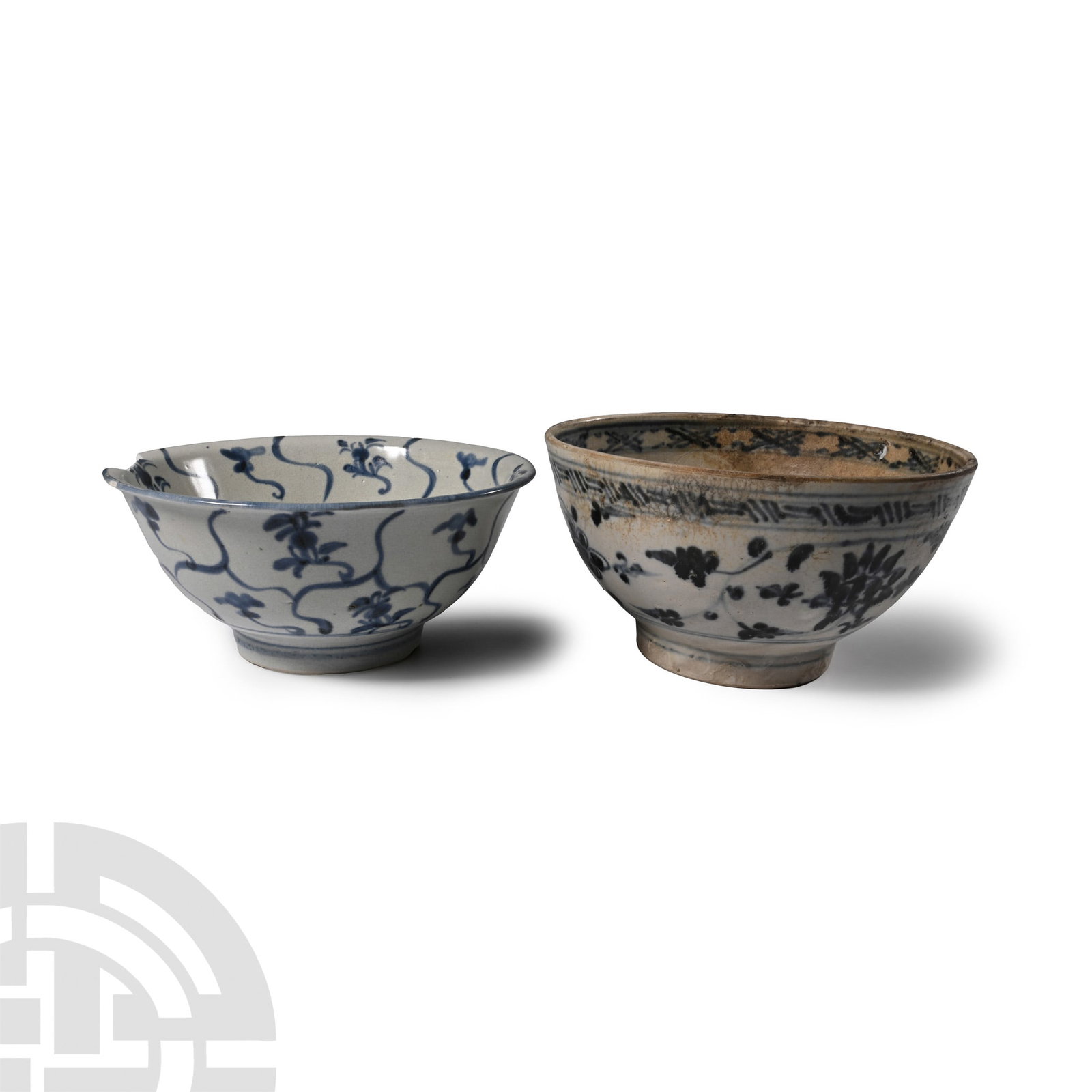 Large Tek Sing Treasure Shipwreck Glazed Blue and White Bowl Group: Early 19th century A.D. Comprising two deep bell-shaped bowls with painted tendrils and floral motifs to both faces. 753 grams total, 15.1-15.5 cm (6 - 6 1/8 in.). [2, No Reserve] Ex Nagel Auction, wi