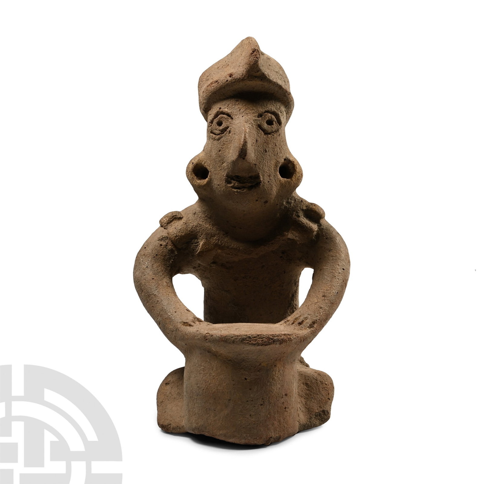 Pre-Columbian Terracotta Colima Drum Player: 100 B.C.-250 A.D. Modelled in the round as a seated male playing a drum, wearing a pointed cap, ear plugs and a necklace, sitting with both hands resting on the edge of the drum. For a similar sculptu