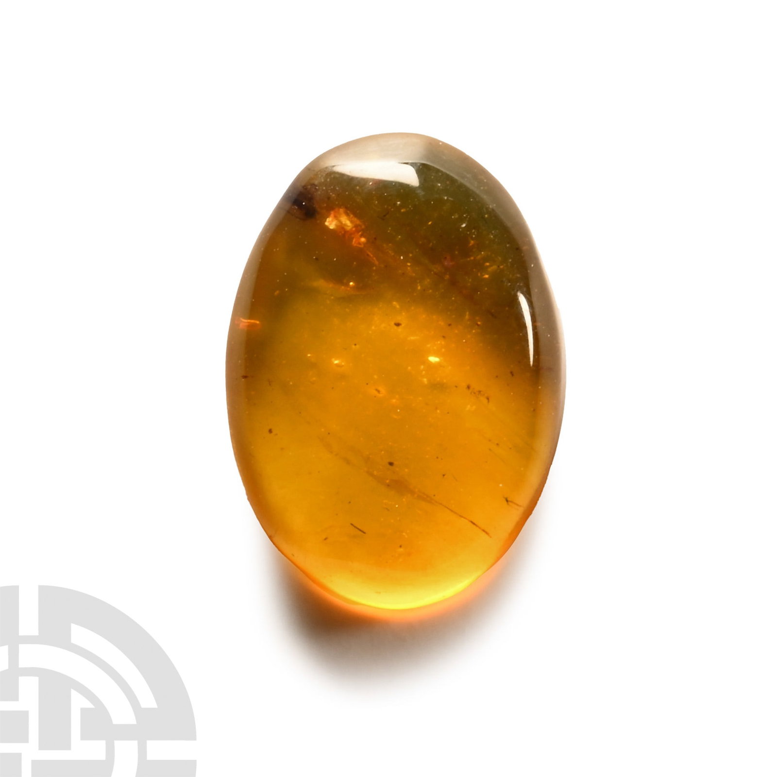 Amber with Insect Inclusion: Oligocene Period, circa 45 million years B.P. Polished oval-shaped specimen with insect inclusion. 0.61 grams, 16.85 mm (5/8 in.). [No Reserve] From a North American collection. Ex property of an East