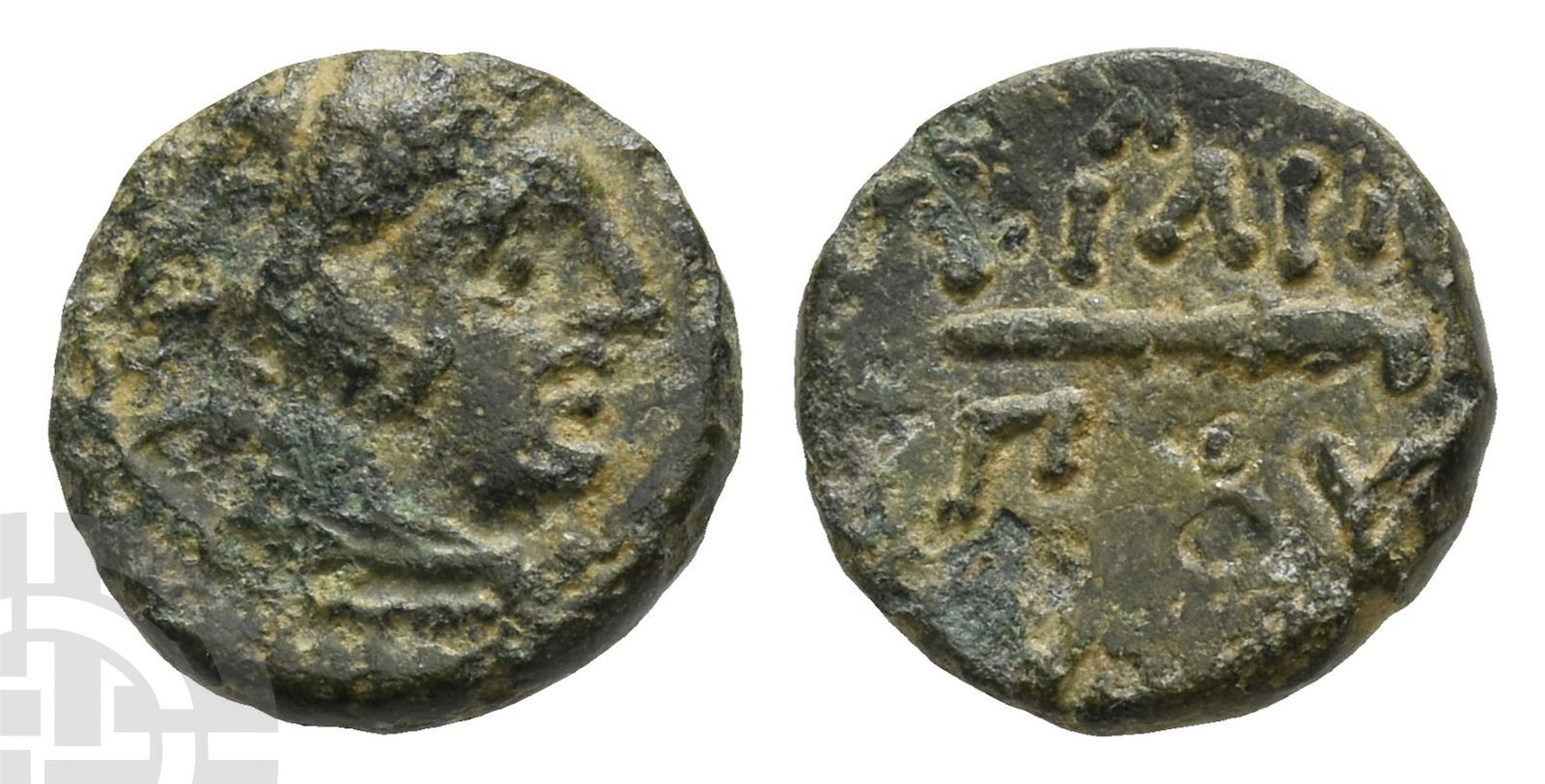 Kingdom of Macedon, Philip II AE 11mm.: 359-336 BC. Uncertain Macedonian mint. Head of Herakles to right, wearing lion skin headdress / Club to right; ?????-??? above and below. SNG ANS 979; HGC 3.1, 889. 1.03gr, 11mm, 8h.Near Very Fine. Pr