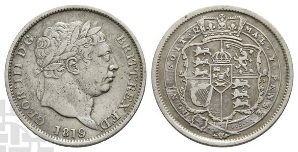 Great Britain. Hanover, George III AR Shilling.: 1760-1820. London mint. Dated 1819. 'Bull Head' type. Last coinage. Engraved by Benedetto Pistrucci and Thomas Wyon. GEOR : III D : G : BRITT : REX F : D :, laureate head to right; date below / Ornate