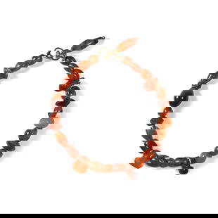 Egyptian Carnelian Bead Bracelet: Late Period, 664-332 B.C. or later Composed mainly of biconical, oblate, and other beads with three larger pendants; with modern gold attachment. 16.4 grams total, 21 cm long (8 1/4 in.). From the pri