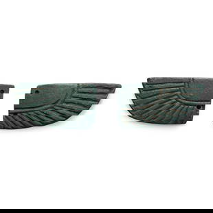 Egyptian Faience Scarab Wing Pair: Late Period, 664-332 B.C. Each flat-section with a band of feathers within the border, two attachment holes. Cf. Tinius, I., Altägypten in Braunschweig. Die Sammlungen des Herzog Anton Ulrich-Museums