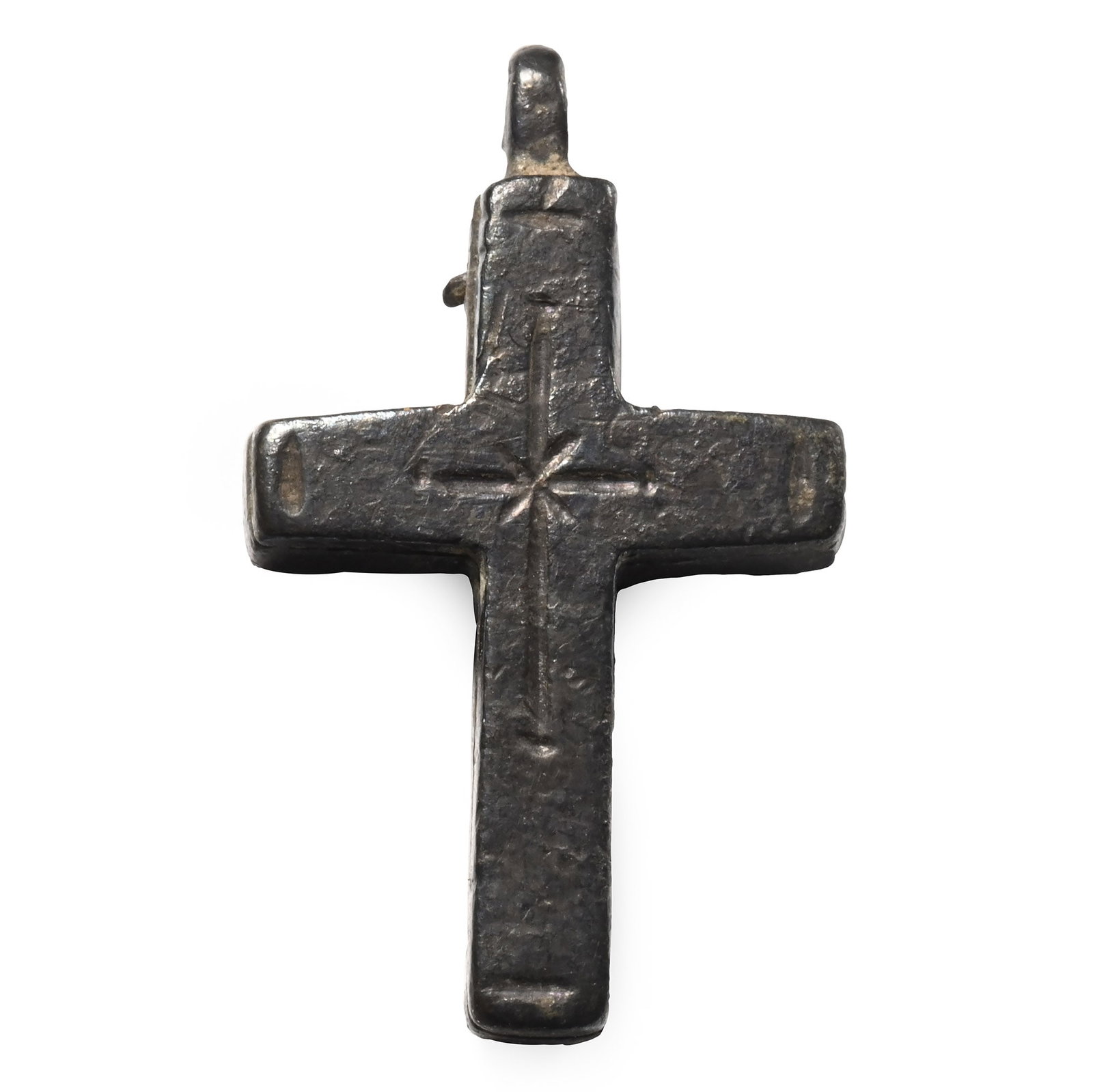 Byzantine Silver Reliquary Cross Pendant: 14th-15th century A.D. Composed of two pieces secured together by a rivet, incised cross motif to both faces. 5.15 grams, 30 mm (1 1/4 in.). [No Reserve] Ex German art market, 2000s. Acquired from an 