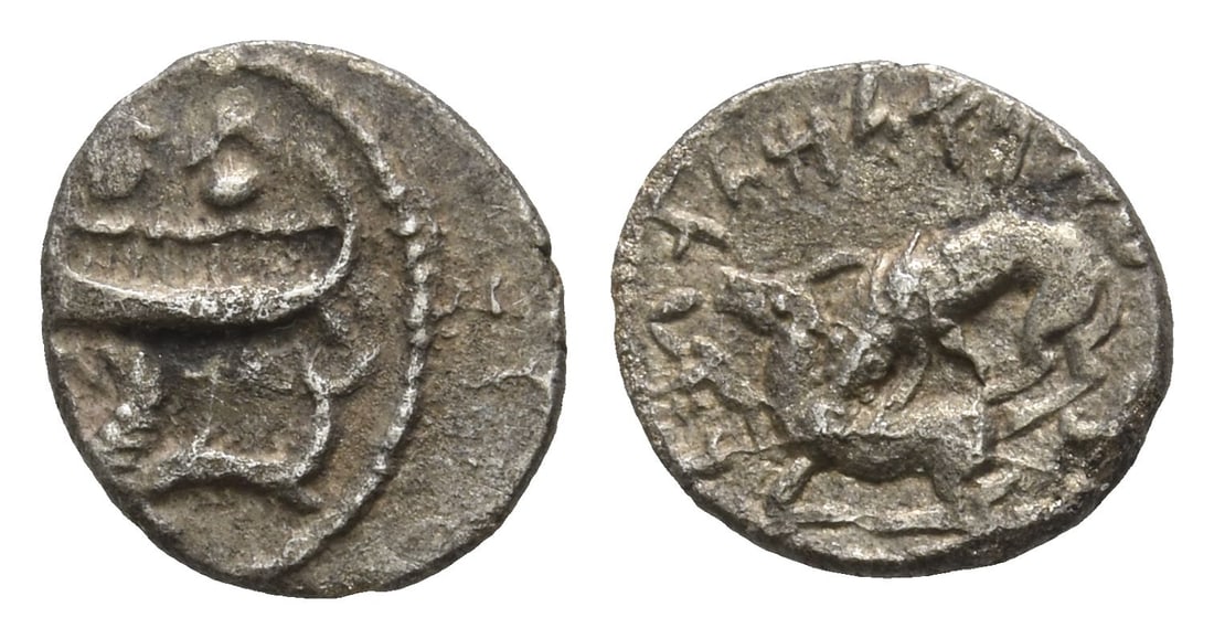 Phoenicia. Byblos, 'Aynel (Enylos) AR 1/16 Shekel.: Circa 350-316/5 BC. Two hoplites, holding shields, on galley to left above waves, prow ending in lion's head; below, hippocamp to left / Lion attacking bull to left. E&E-B Series IV.4.2; HGC 10, 139.