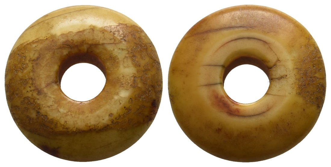 Minor Asia and Levante Bone Weight of Uncertain Standard.: Circa 750-300 BC. Dome-shaped bone ring. For a similar example see British Museum 1969,0401.120. 5.16gr, 25mm x 7mm. Condition as seen. Found Hebron in 1971. From the Gabby family collection, 1960s-19