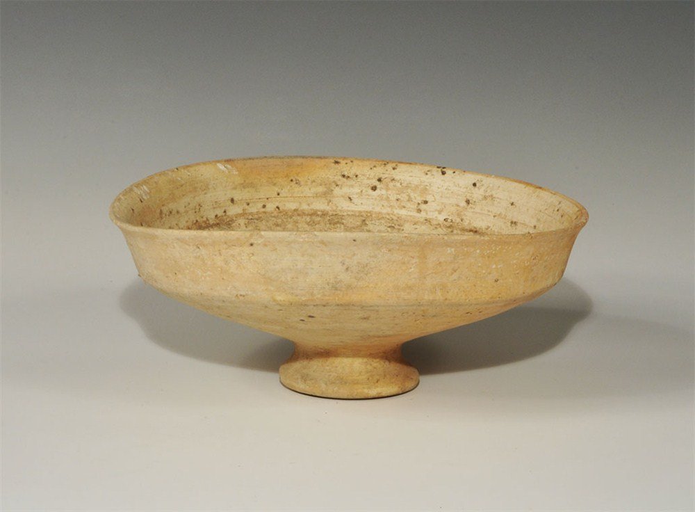 Bronze Age Ceramic Glazed Whiteware Chalice: Holy Land, 1200-1000 BC . A broad bowl with pedestal base and carinated profile, slightly everted rim; the inner face glazed. 404 grams, 20cm (8"). Ex Rihani Family Collection.